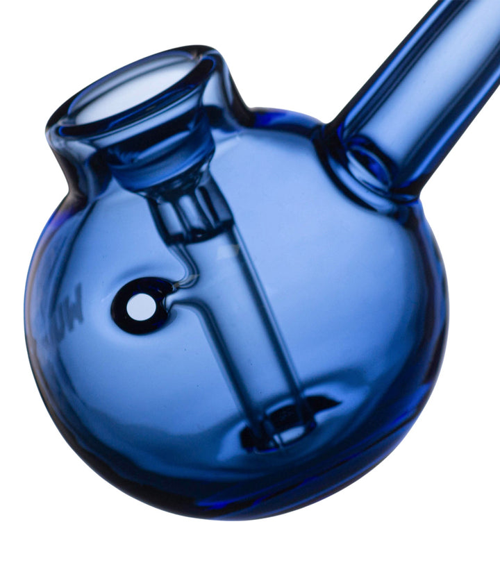 Close-up of a blue glass bubbler carb on a white background